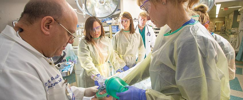 Nurses working with doctor in surgery room