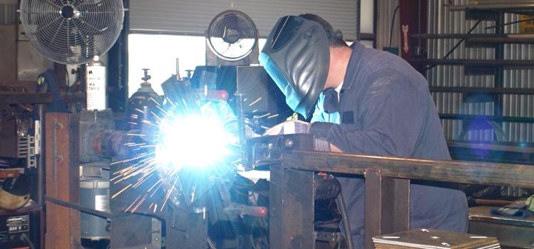 sparks fly as welder works 